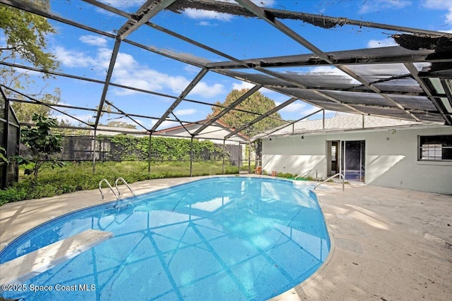 view of pool featuring a fenced in pool, a lanai, a patio, and fence