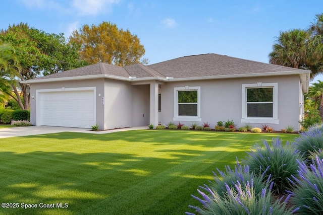 view of front facade featuring an attached garage, driveway, a front lawn, and stucco siding