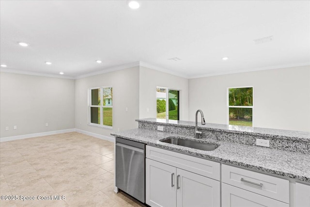 kitchen featuring crown molding, a sink, light stone counters, and stainless steel dishwasher