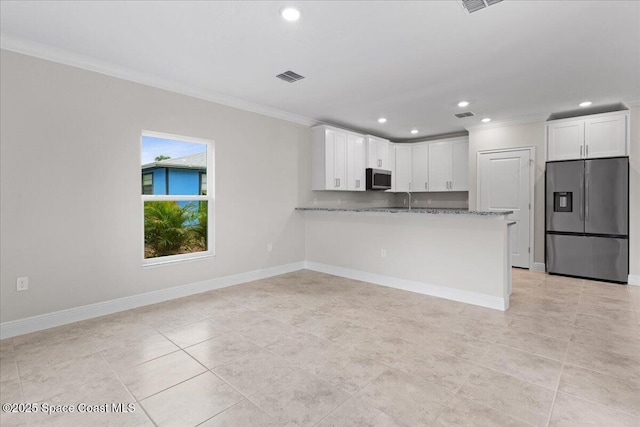 kitchen with white cabinetry, visible vents, stainless steel appliances, and crown molding