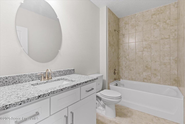 bathroom with washtub / shower combination, a textured ceiling, vanity, and toilet