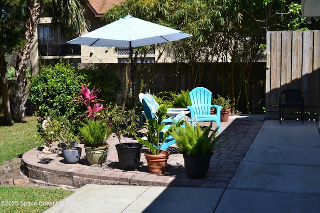 view of patio with fence