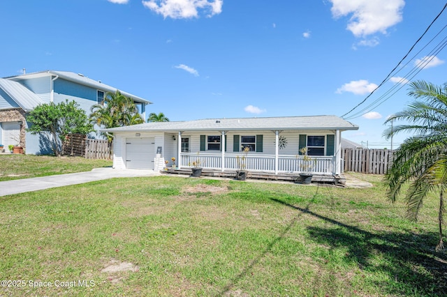 view of front of house with a porch, driveway, an attached garage, and fence