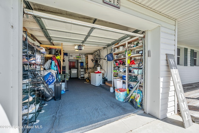 garage featuring a garage door opener