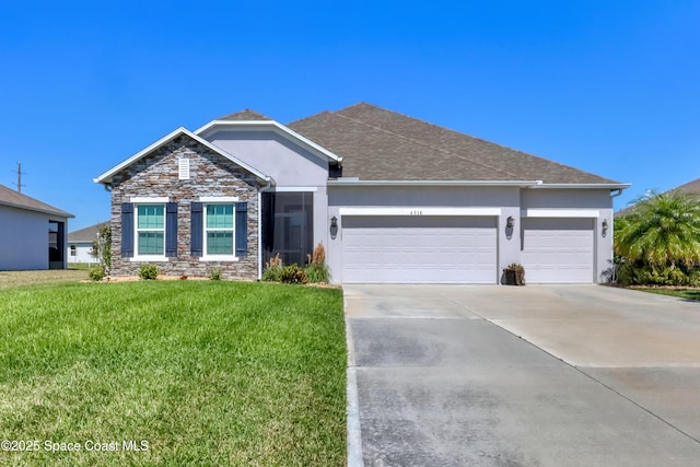 single story home featuring a garage, concrete driveway, stone siding, stucco siding, and a front yard