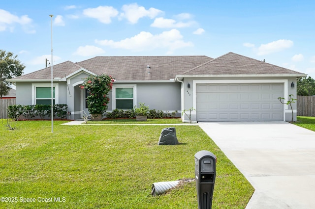 single story home featuring driveway, a garage, stucco siding, fence, and a front yard