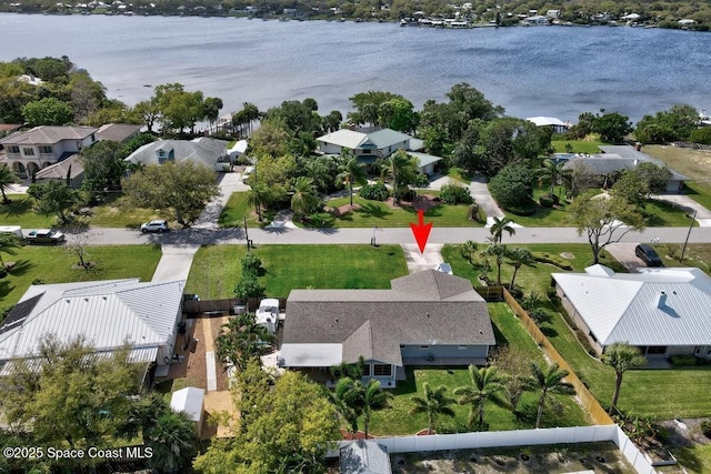 aerial view with a water view and a residential view