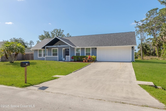 ranch-style house with a garage, driveway, a front yard, and fence