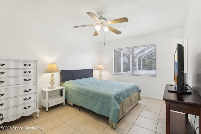 bedroom featuring a ceiling fan and light tile patterned floors