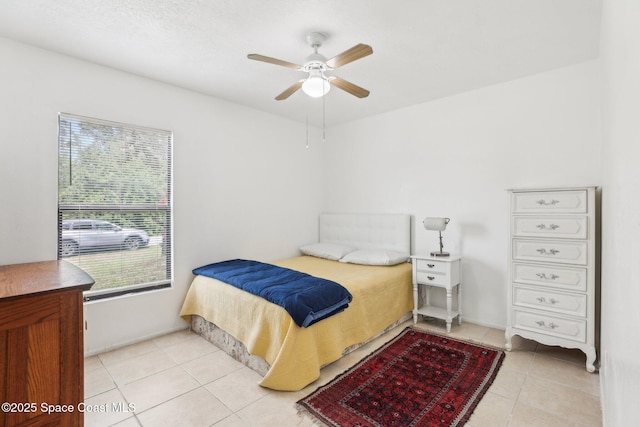 bedroom with light tile patterned flooring and ceiling fan