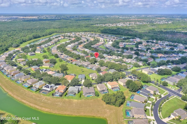 aerial view with a residential view and a water view