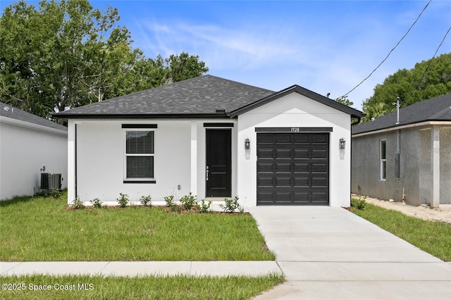 view of front of property with central AC unit, roof with shingles, an attached garage, a front lawn, and stucco siding