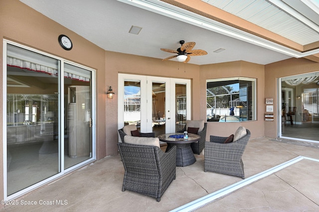 view of patio / terrace featuring french doors and a ceiling fan