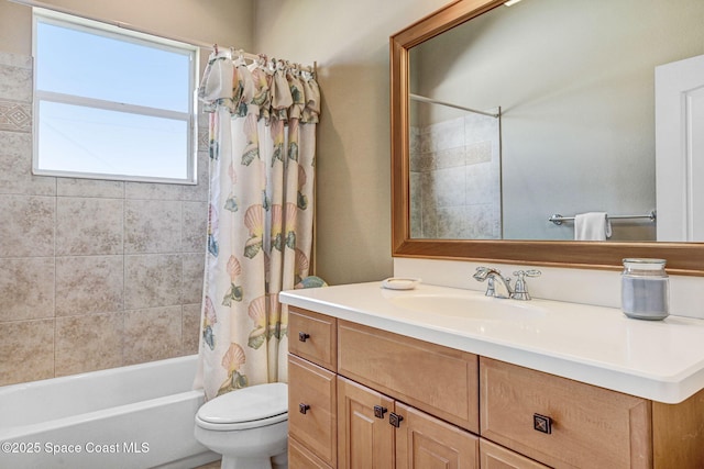 full bath with vanity, shower / bath combination with curtain, and toilet