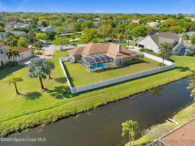 birds eye view of property with a residential view