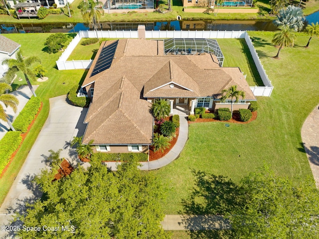 drone / aerial view with a water view