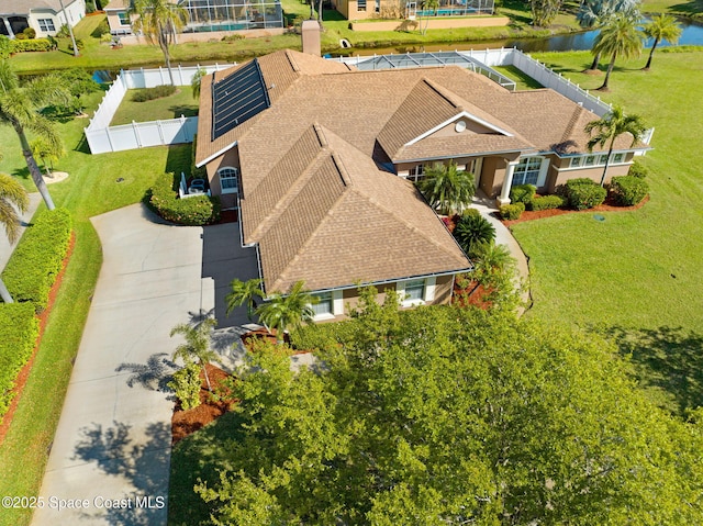 drone / aerial view with a water view