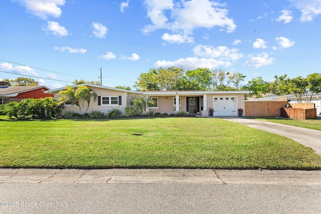 ranch-style house featuring a garage, fence, a front lawn, and concrete driveway