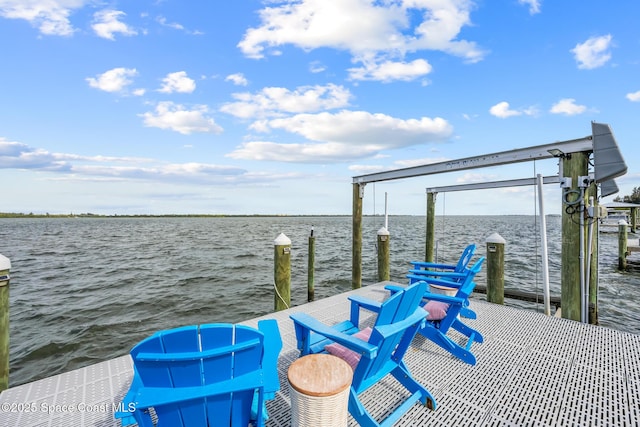 dock area with a water view