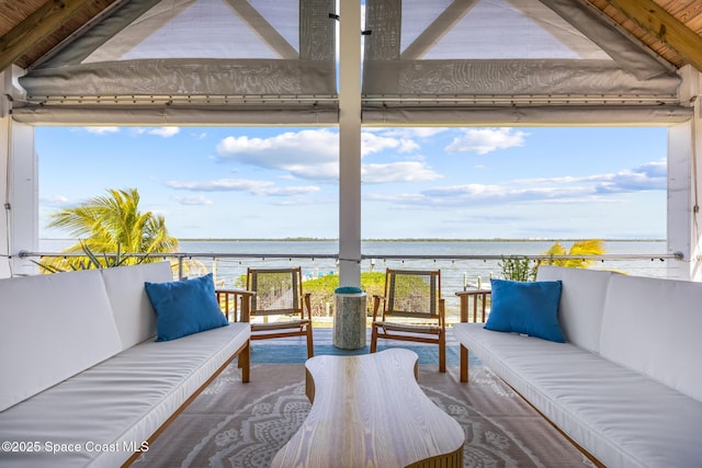 view of patio / terrace with a water view and an outdoor hangout area