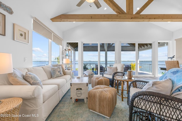 living area with recessed lighting, a water view, ceiling fan, high vaulted ceiling, and beamed ceiling