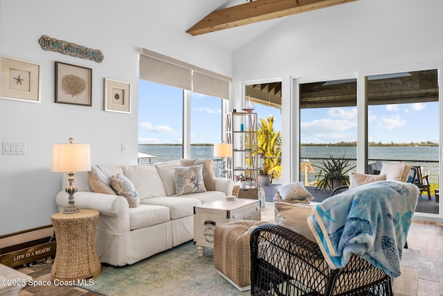 living room featuring high vaulted ceiling, beamed ceiling, and a water view