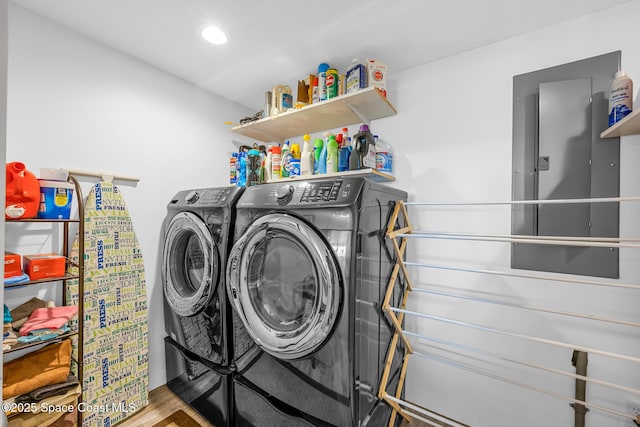 washroom with wood finished floors, laundry area, recessed lighting, and separate washer and dryer