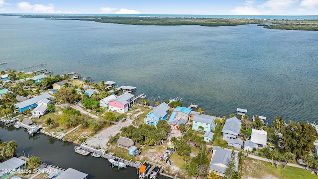 aerial view featuring a water view and a residential view