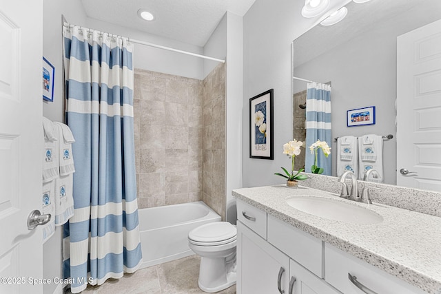 bathroom featuring toilet, shower / tub combo with curtain, a textured ceiling, tile patterned flooring, and vanity