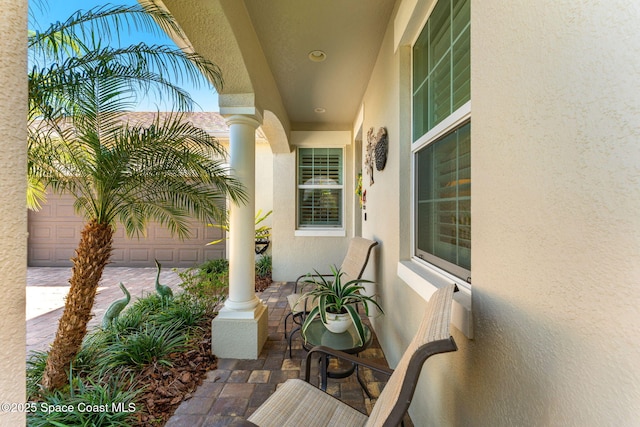 view of patio with a garage