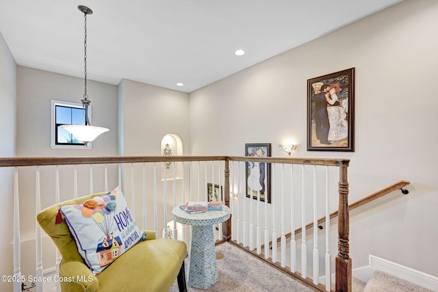 interior space featuring an upstairs landing, carpet flooring, recessed lighting, and baseboards