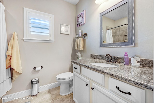 bathroom with baseboards, toilet, a shower with shower curtain, tile patterned floors, and vanity