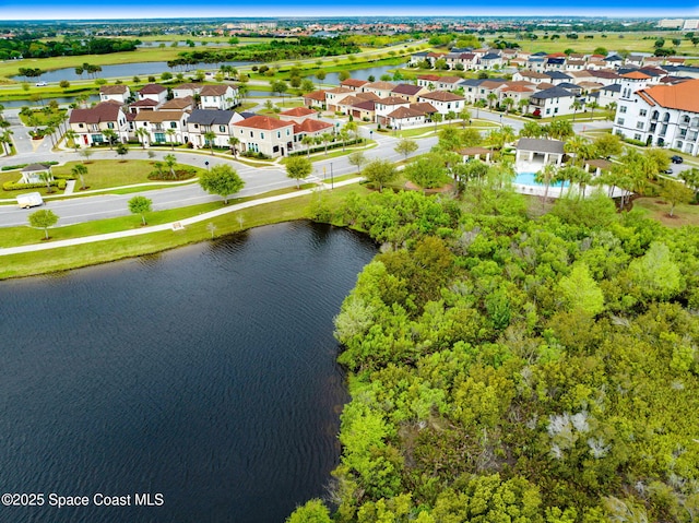 aerial view featuring a residential view and a water view