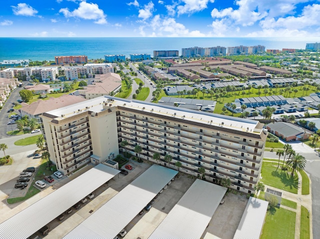 bird's eye view with a water view and a view of city