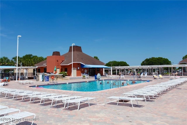 pool with a patio