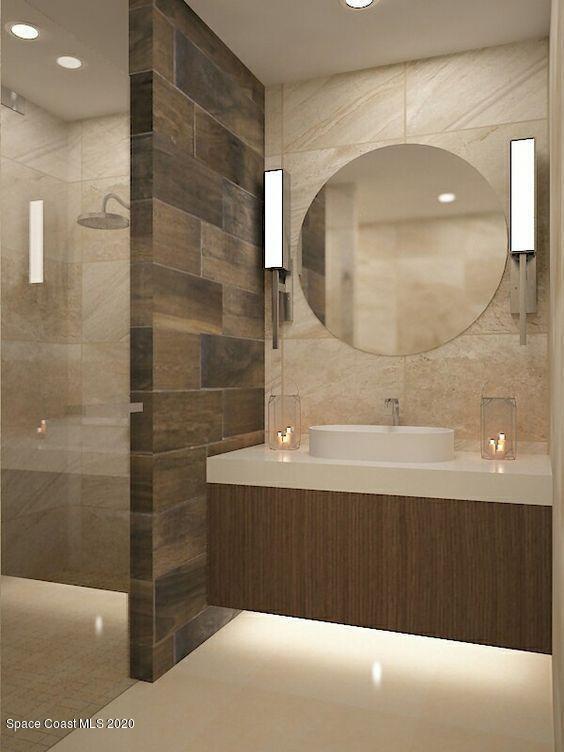 full bathroom featuring recessed lighting, tiled shower, tile walls, and vanity