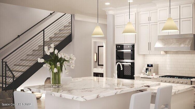 kitchen with tasteful backsplash, extractor fan, light stone countertops, white cabinetry, and dobule oven black