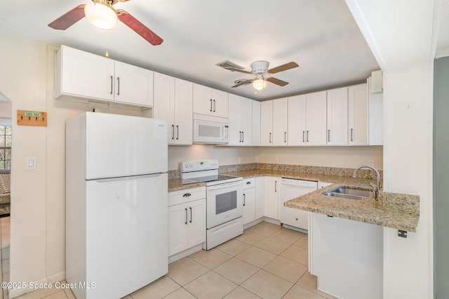 kitchen with light tile patterned floors, visible vents, white cabinetry, a sink, and white appliances