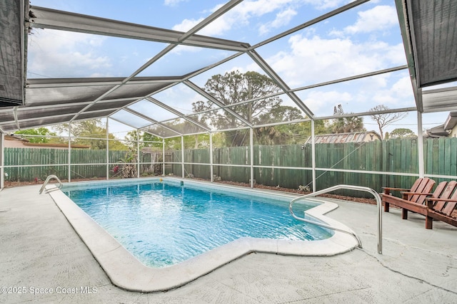 view of pool featuring a lanai, a fenced backyard, a fenced in pool, and a patio