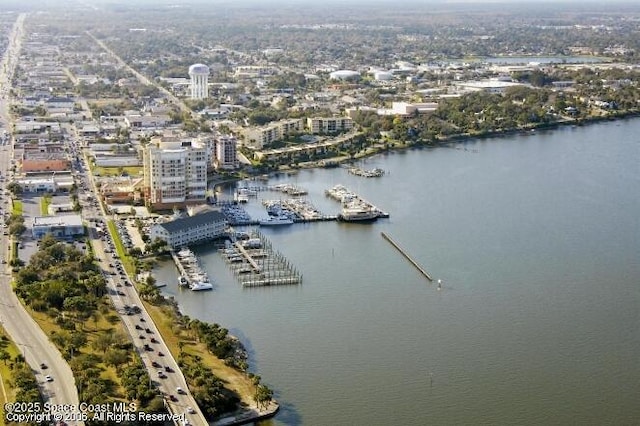 drone / aerial view featuring a water view