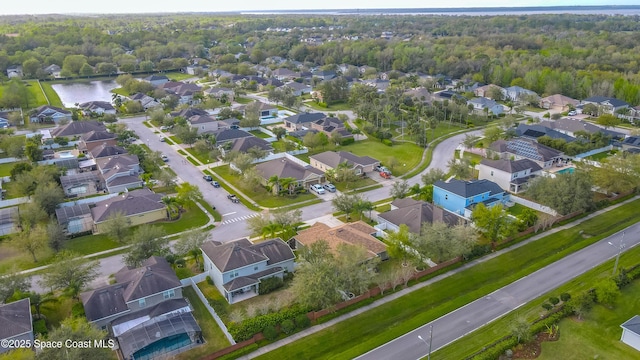 aerial view featuring a residential view and a water view