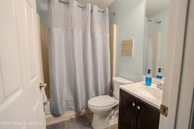 full bath featuring toilet, shower / bath combination with curtain, and vanity