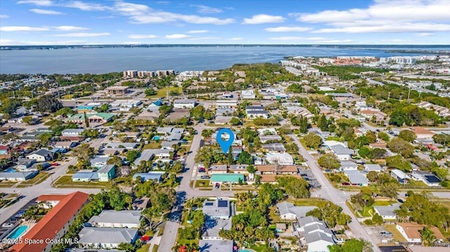 birds eye view of property featuring a residential view and a water view