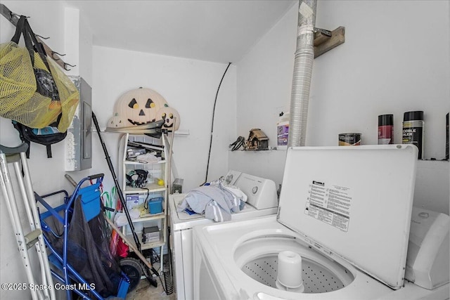 washroom featuring laundry area and separate washer and dryer