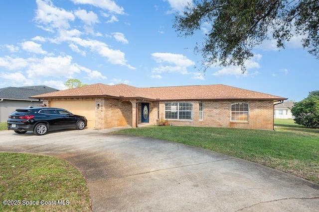 ranch-style home with driveway, brick siding, a garage, and a front yard