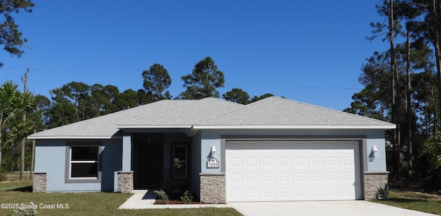 ranch-style house with stone siding, an attached garage, concrete driveway, and stucco siding