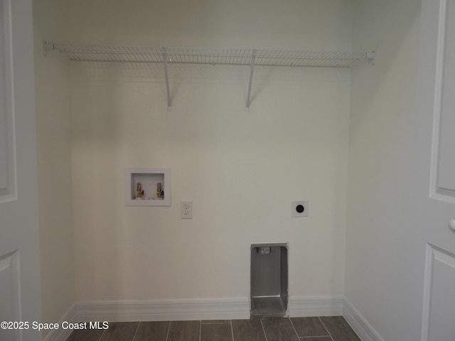 washroom featuring laundry area, baseboards, hookup for a washing machine, wood finish floors, and electric dryer hookup