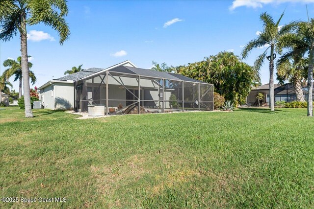 view of yard featuring glass enclosure