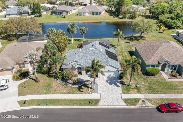 aerial view with a residential view and a water view