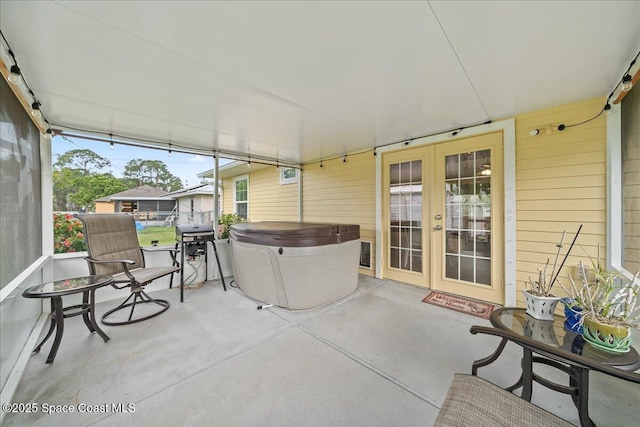 sunroom / solarium with french doors